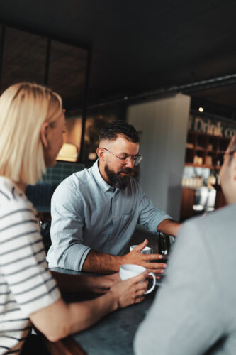 Businessman having a casual team meeting