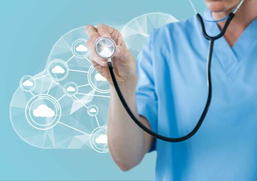 person with stethoscope in front of a technology cloud