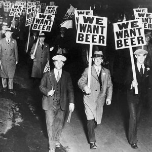 Chicago Prohibition - Men protesting with We Want Beer Signs Sq
