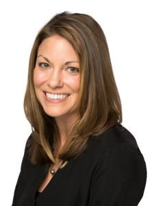 headshot of Liz Keller wearing a black shirt